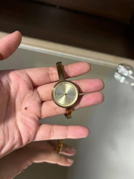 DKNY original golden watch 4