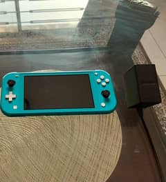 Nintendo switch lite with 1 free game and original charger!!!!