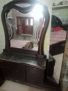 bed and dressing table