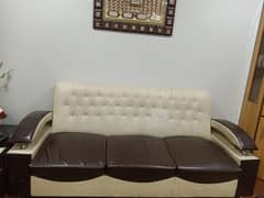 5 seater sofa with two tables