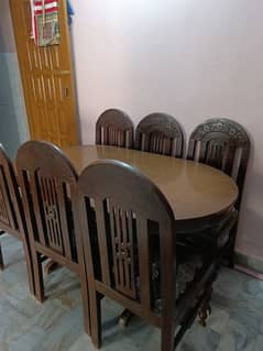 Wooden Dining Table with six chairs