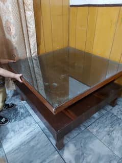 solid wooden glass table