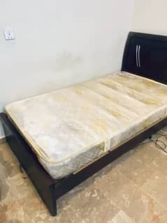 Wooden single bed with spring mattress for urgent sell in H-13