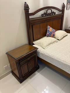 Double bed with mattress side tables and dresser