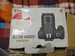 canon 4000D 11-55 lens, box & dual battery contact no 03004236873