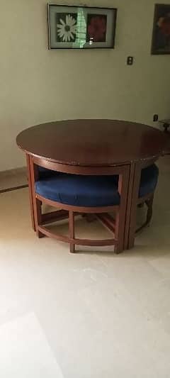 4 chairs and one. round table