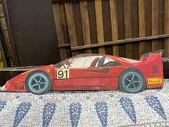 Handmade Ferrari painted on wooden sheet. Hooks attached on the back.