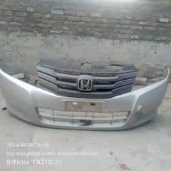 Honda city geniune front bumper with grill