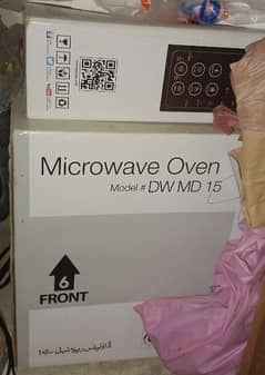 New unopened Microwave Oven