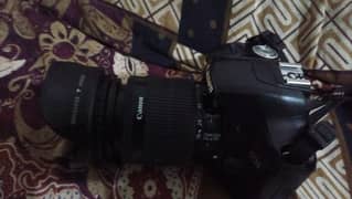 canon eos 500d with 2 card jackets, bag, charging cable, battery.