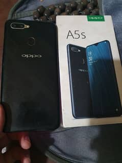 oppo a5s phone and box