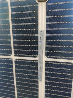 JA Bi-fical 545W solar panel and stand.