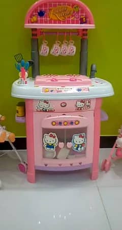 shocking pink ND baby pink stylish kitchen n doll pram,d accessories. .