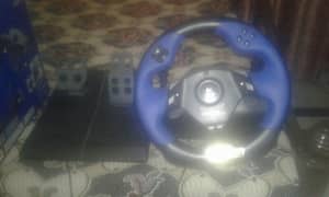 Logitech Driving Force feedback wheel for ps2 and pc 180 degree wheel.