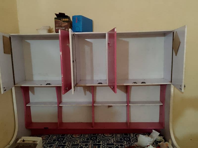 single bed with books and toy racks with molty foam mattress 8