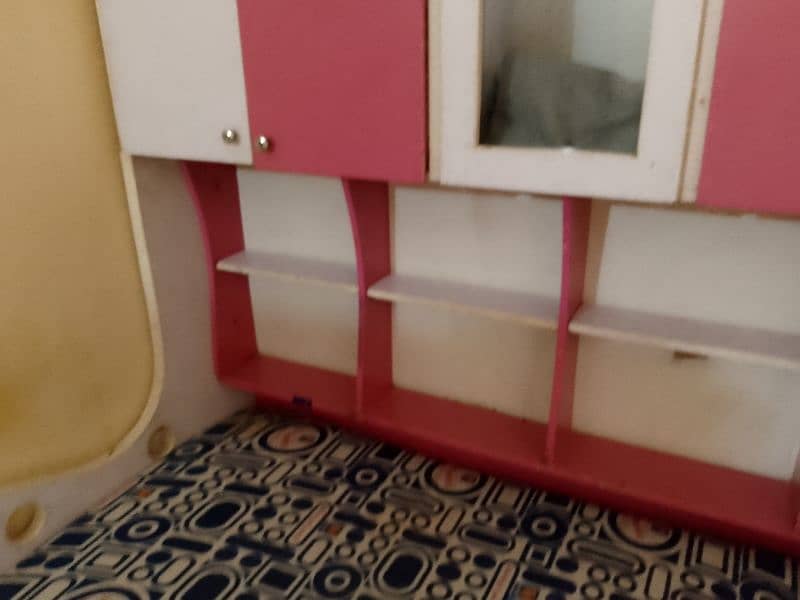 single bed with books and toy racks with molty foam mattress 16