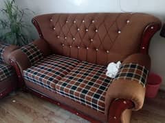 sofa set 7 seater and table for sale in Islamabad.