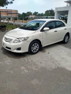 toyotay Corolla car with driver