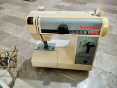 sewing machine singer featherweight plus 324