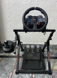 Logitech G29 ( along with shifter ,stand and 1 game)