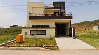 Stunning 5 Marla Designer House in DHA Phase 3, Islamabad. Modern luxury meets comfort in this elegant home.