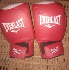Two Pairs Of boxing Gloves Sizes 10 and 12
