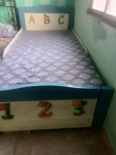single wooden bed