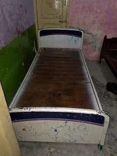 02 single specially manufactured wooden bed,