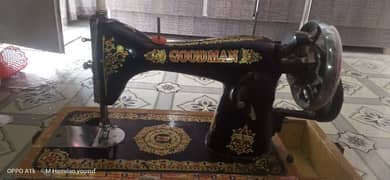 sewing machine with box. .