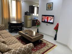 Fully Furnished Apartment For Rent In Sector C Bahria Town Lahore.