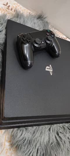 PS4 pro  with EAFC 24(digital edition) and NFS and 2 controllers