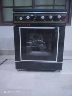 Singer microwave oven and cooking range