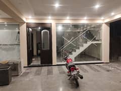 1 KANAL GROUND & FIRST FLOOR FOR RENT ON MAIN ROAD OPP UCP