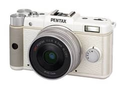pentax q with 50mm lens and 2 batteries