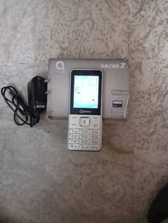 Q mobile Razor Z slim design with wireless FM