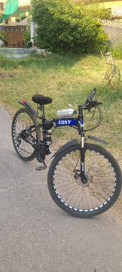 foldable voxy cycle with gears and shocks