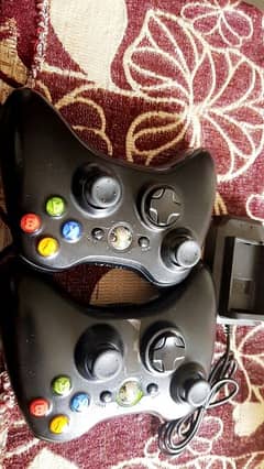 xbox 360 2 genuine wireless controllers along with batteries
