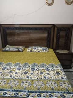 King size bed with side table and dressing