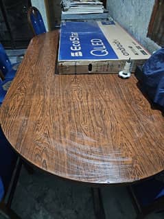 Dining table and Seven Chirs and good Condition