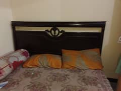 Wooden bed for sale.