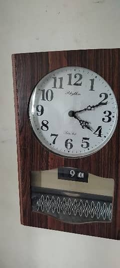 Antique wooden Japan Rhythm vintage wall clock day date