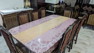 Wooden Dining Table with Cushioned Chairs