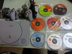 Playstation 1 ps one with 8 original games and 2 original controllers
