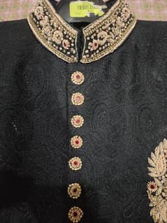 Black Sherwani with golden hand embroidery with kulla, shawl, khussa