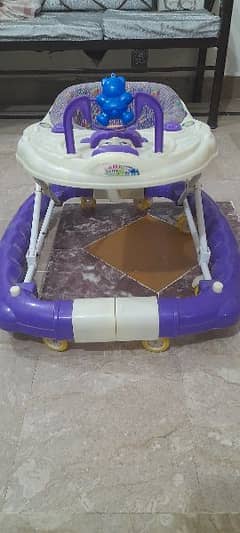 BABY WALKER  IN NEW CONDITION