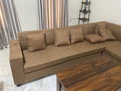 8 seater sofa set is up for sale with table. brand new.