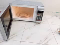 Dawlance microwave oven 2 in 1 grill baking bhi hote h VIP condition
