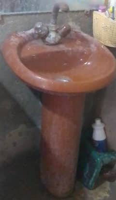 commode and washbasin