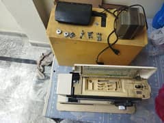 Embroidery pico and sewing machine in working conditions