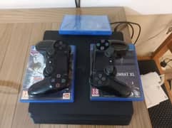 Ps4 slim 1Tb with 2 controllers and games